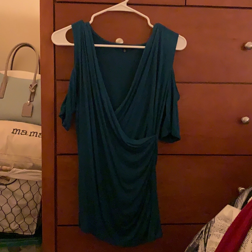 Green shirt with cross front